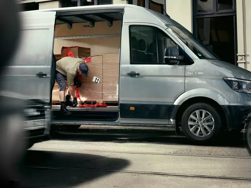Extra wide, side cargo space door